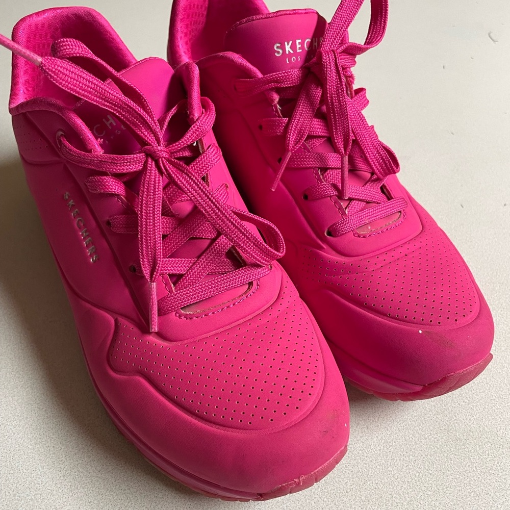 Hot pink Sketchers sneakers